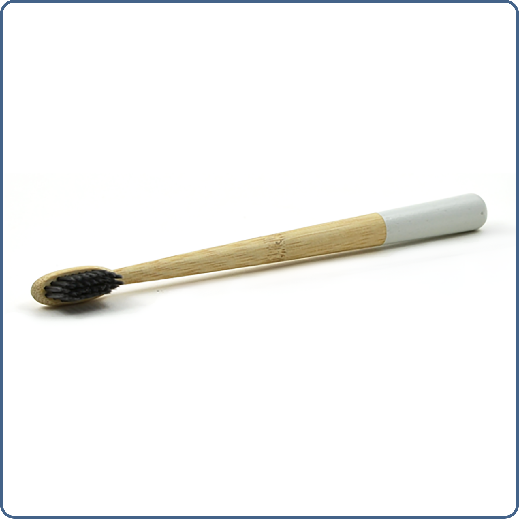 Brosse à dents en bois avec base colorée – hygiène zéro déchet.